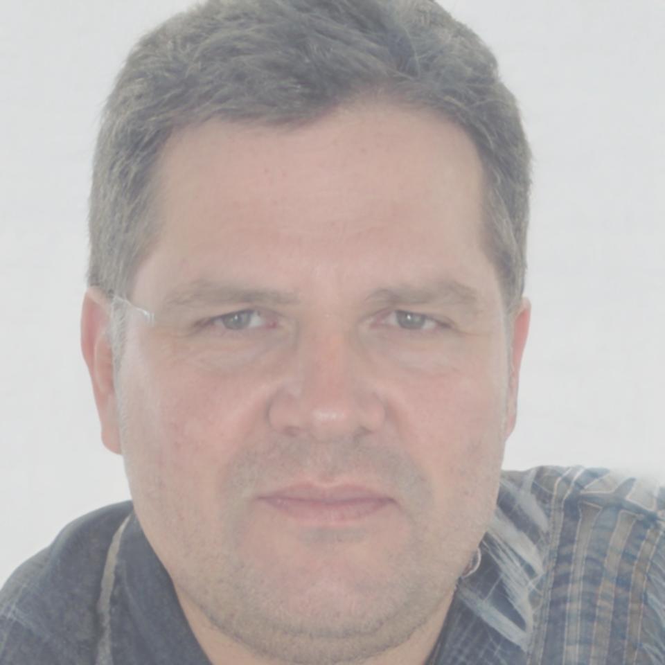 Alaric Whitmore professional headshot